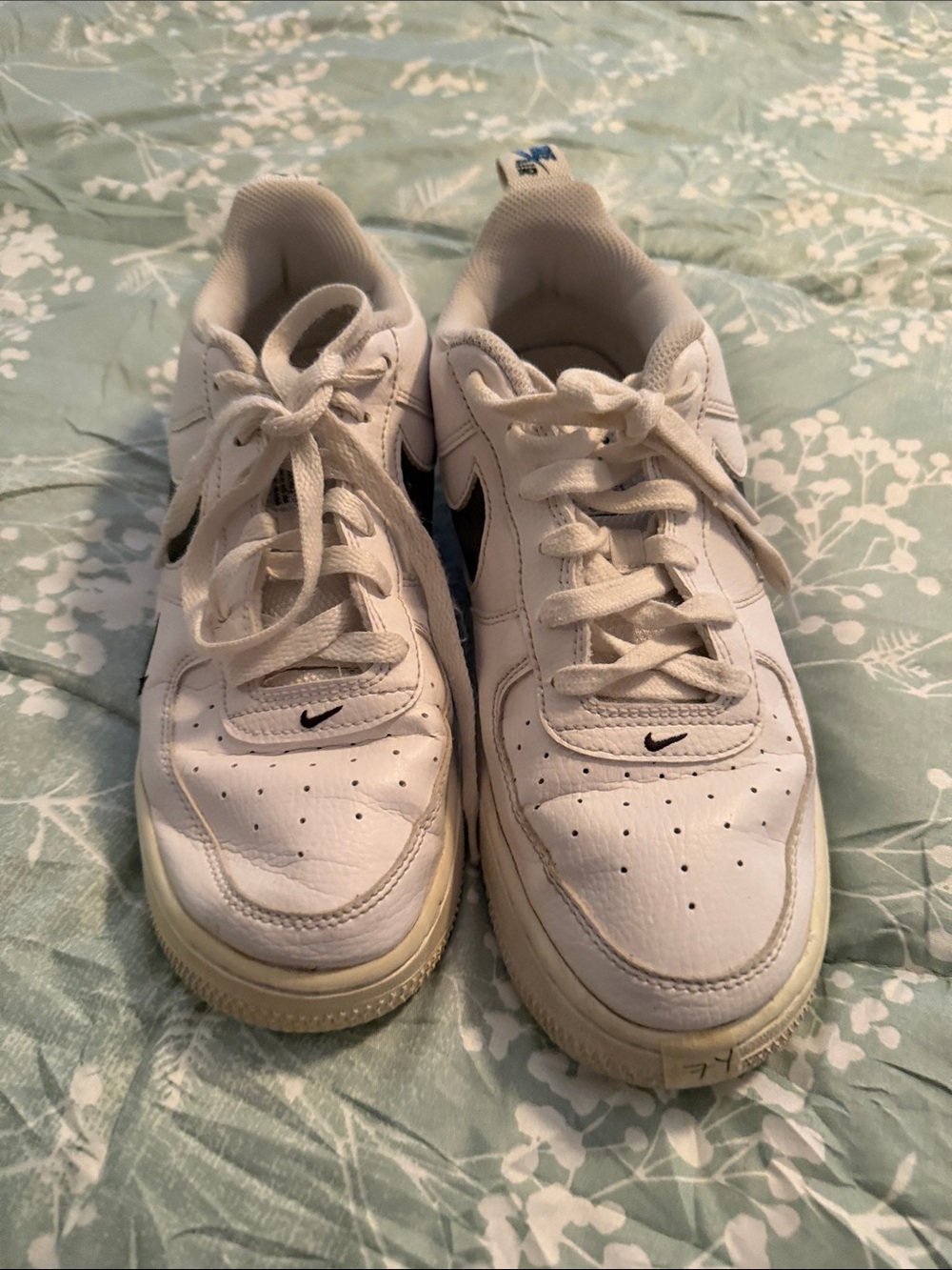 Nike Kids White Sneakers with Black Swoosh
